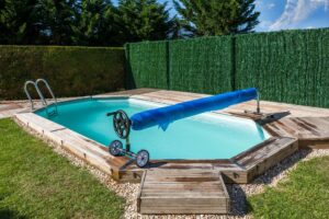 Enrollador telescópico Gre con ruedas grandes para piscinas enterradas hasta 5,5 m · Gre
